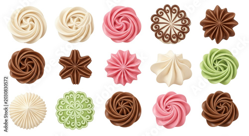 Assorted buttercream frosting swirls and whipped cream dollops, collection of 15 decorative cake toppings, colorful icing rosettes on white background