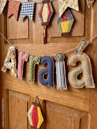 Arraia banner strung across a wooden door