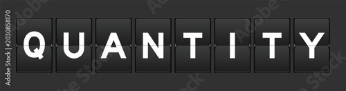 Fotografía Black color analog flip board with word quantity on gray background
