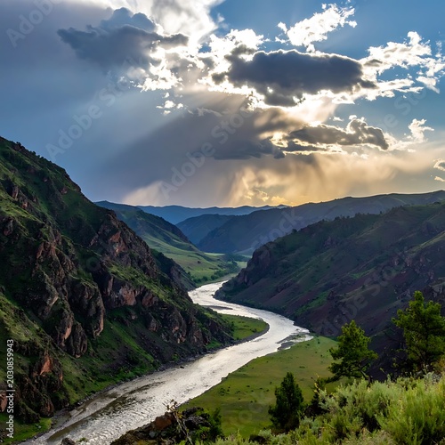 Winding river through green mountain landscape.