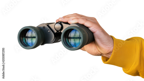 Konstfotografi Hand holding dark green binoculars with blue lens reflection