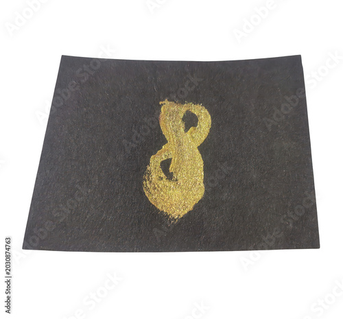 Golden decorative embroidery on dark fabric