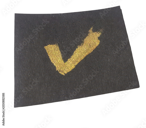 Golden chevron stripe on dark fabric background