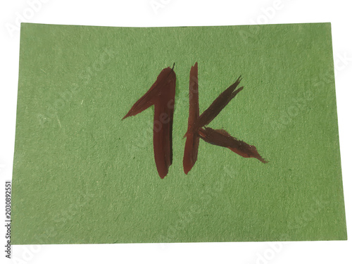 Green fabric with bold red number one and letter k