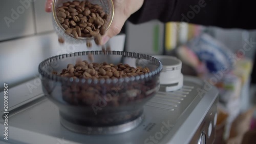 Adding Coffee Beans to Grinder Container