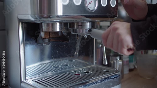 Used Espresso Coffee Puck in Portafilter Basket
