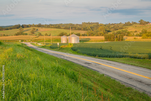 rural highway across hilly Missouri farmland, summer scenery