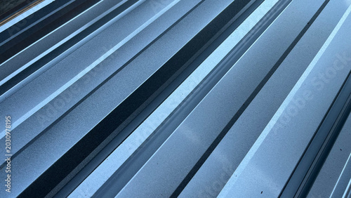 Konstfotografi Close Up of Diagonal Galvalume Metal Roofing Sheet with Sun Flare