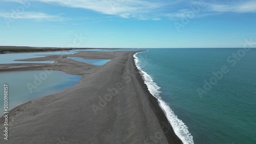 Aerial view of coastal sandspit and tidal lagoons at Peninsula Valdes Patagonia Argentina