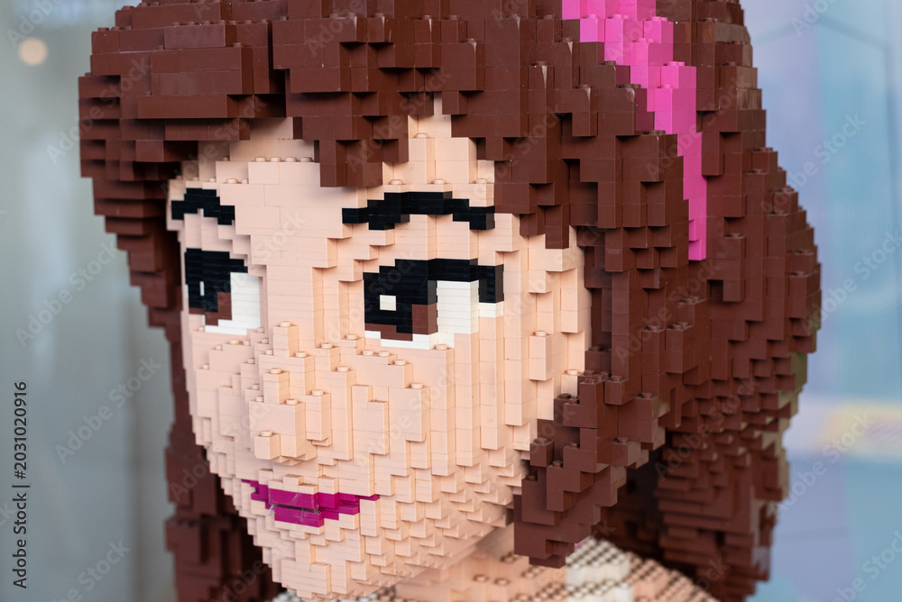 Obraz premium Bangkok, Thailand – December 31, 2023: Close-up of a life-size LEGO brick-built sculpture depicting a female character, on display at a LEGO store.