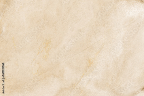 Foto A textured, parchment-like background with subtle, organic stains and folds, evoking a sense of age and history