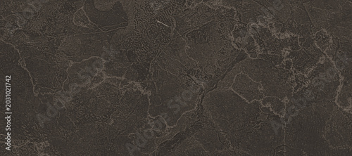 Photos A dark grey stone surface with subtle lighter veining