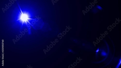 optical light ray loop animation on black screen. Sun rays view, sun spotlight glowing burst concept. optical light beams on black background. 