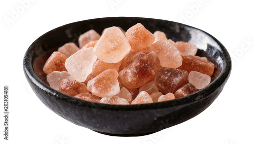Photos Pink Himalayan rock salt crystals in a dark bowl, isolated on transparent backgr