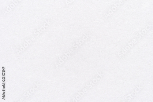 Blank White Paper Textured Surface Lying Flat On Neutral Background For Studio Closeup And Macro Stationery Backdrop Suitable For Minimalist Design And Copyspace Applications.