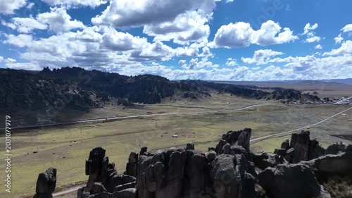 Drone push forward with tilt down over rock formations at Huayllay Stone Forest in Pasco, Peru