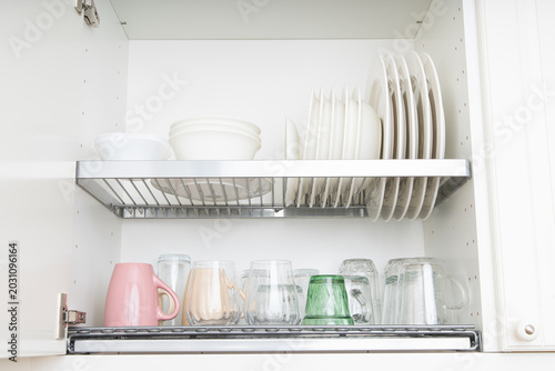 Obraz na plátne A kitchen cabinet with shelves