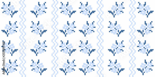 Tablou pe pânză Blue cross stitch floral seamless pattern with traditional embroidery folk art motifs