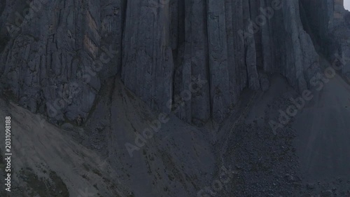 Slow aerial pull back revealing Castillo de Vichaycocha rock formation in the high Andes of Lima, Peru
