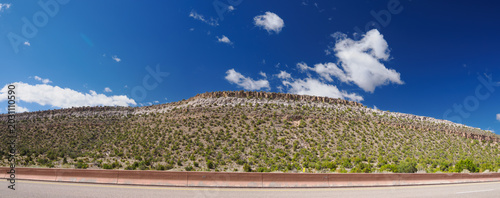 Fotografi Bandelier, New Mexico - May 6, 2026: New Mexican desert landscape on the road to