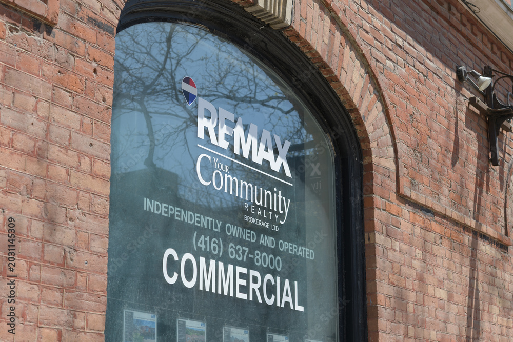 Naklejka premium window with sign of Toronto office of RE/MAX Your Community Realty, 187 King St E (Little York Hotel, 1879-1880, designed by Langley & Burke)