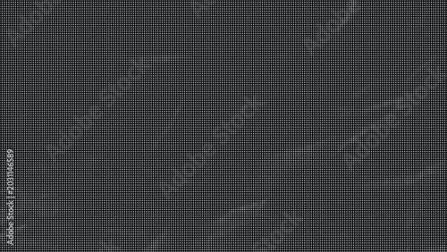 A dark grey background with white streaks and texture appears
