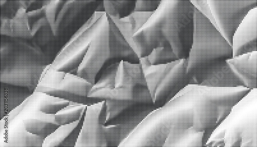 Fotografie Gray crumpled paper texture fills the entire frame with deep shadows