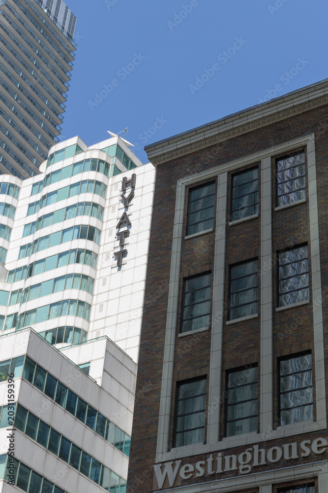 Naklejka premium exterior of Hyatt Regency and Sutton Place hotels on King St W at Blue Jays Way, Toronto