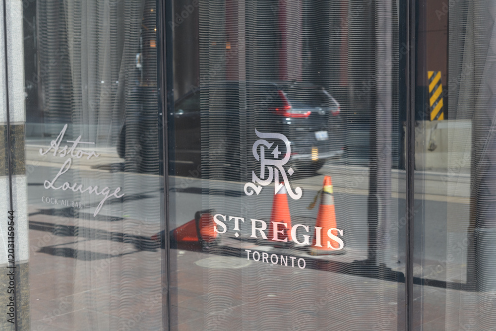 Naklejka premium vinyl window sign at The St. Regis, a five star hotel, located at 325 Bay St, Toronto