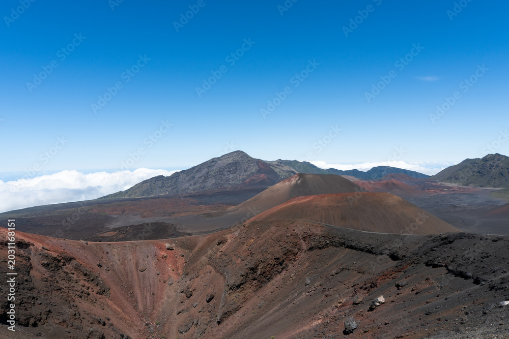 Naklejka premium Scenic view of a volcanic landscape under a clear blue sky