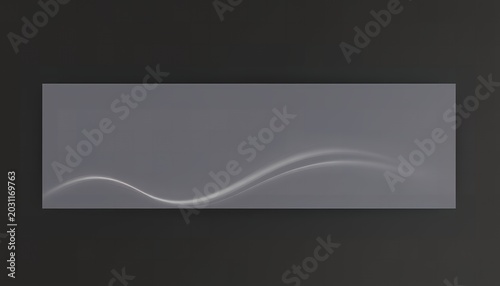 A gray rectangular background with a wavy white line on a dark gray border