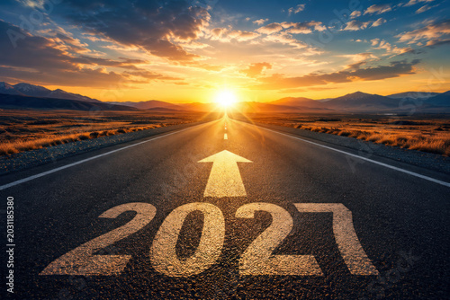 Open Road Toward Bright Sunset with 2027 Year Marking and Forward Arrow Concept