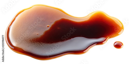 Close-up splashing red sauce on white background with dramatic lighting