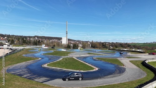 Aerial Wide View of Driving Safety Training Center with Skid Pads and Cars