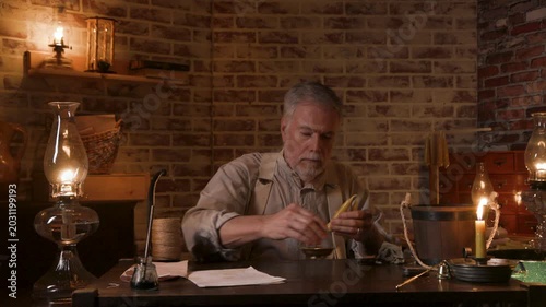 19th century candle maker trimming candles