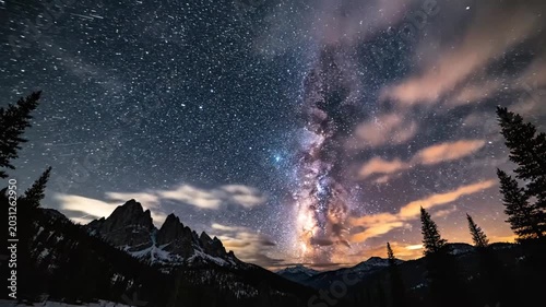 Stunning Milky Way Galaxy Over Mountain Peaks Under Starry Night Sky.