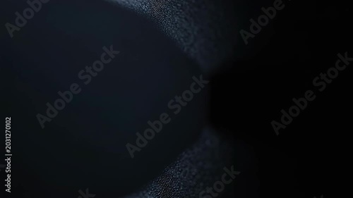 A dark and moody texture with a black hole-like shape in the center, evoking a sense of mystery and intrigue.