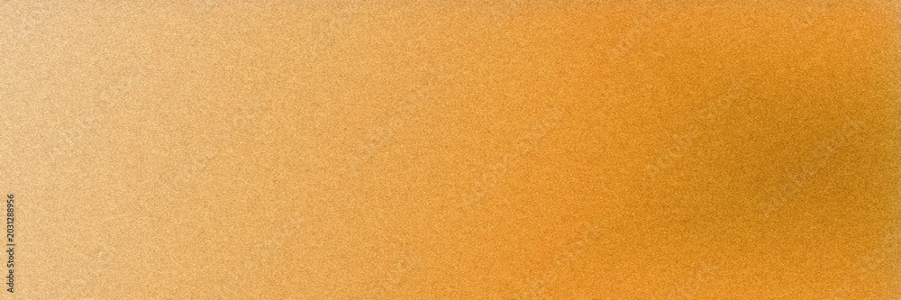 Fototapeta premium Lush golden orange hues with a fine grain texture and subtle glow create a warm, luxurious background ideal for autumn themes, invitations, packaging, and premium branding.