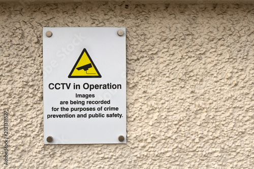 Fotografie CCTV warning sign for surveillance and public safety