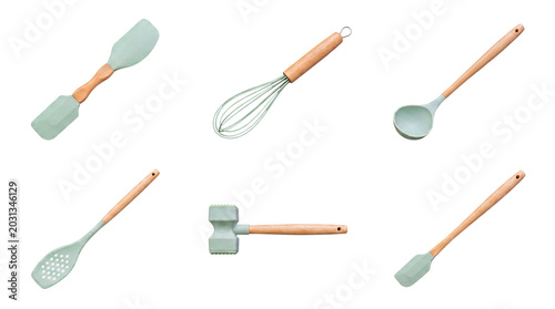 Fotografía Collection of modern kitchen utensils with wooden handles and green silicone heads, isolated on transparent