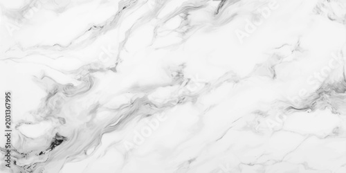 Fotografía A textured black and white abstract winter background features a frozen marble p
