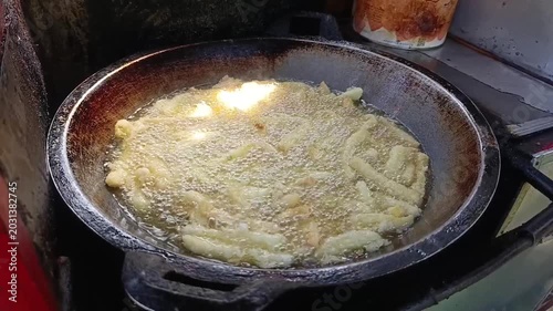 Frying Pancakes Cooking Scene in Outdoor Kitchen