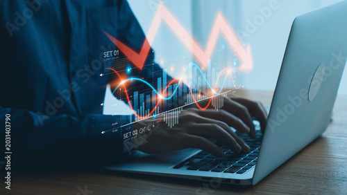 Tableau sur toile Economic caution visualized with fluctuating market graph, alert symbols, and negative data trends