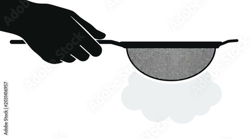 Photos Hand holding a frying pan handle.