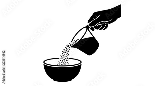 Photos Hand pouring cereal into bowl.