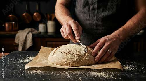Someone Cutting Loaf Bread Knife Table