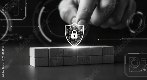 Hand placing digital shield with lock icon onto wooden blocks against abstract data background