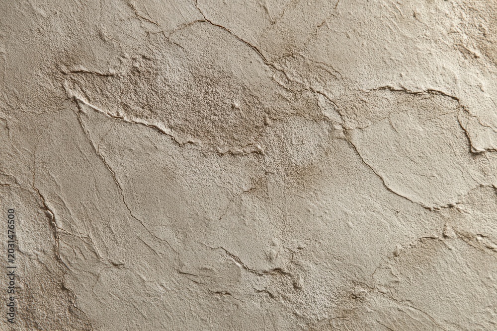 Naklejka premium Minimal neutral surface: warm gray plaster texture for design mockups