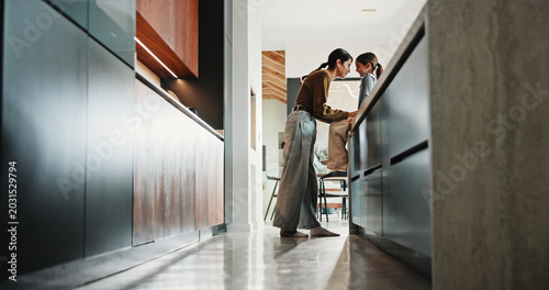 Love, mom or girl in kitchen with smile, childcare or bonding together on weekend break. Trust, parent or child in house with conversation, family connection or happy moment in healthy relationship.