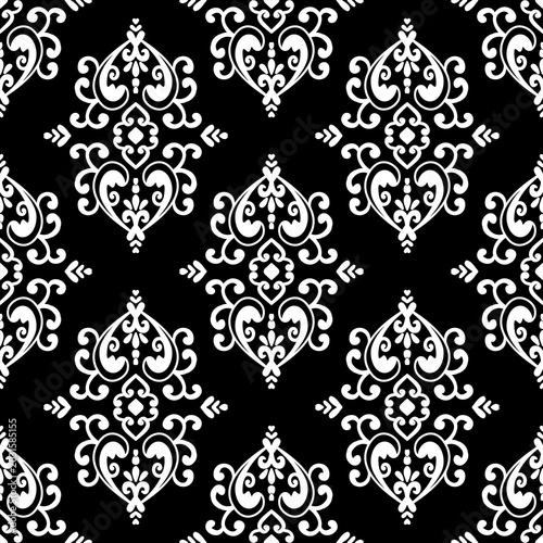 Elegant black and white seamless damask pattern. Classic victorian style motif for textile print, wallpaper background, and luxury fabric design. Symmetrical monochrome geometric ornament.